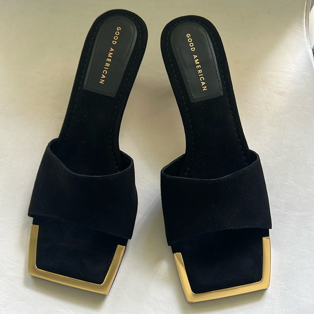 Good American Black Heels with Sleek Design size 10, made in Spain.